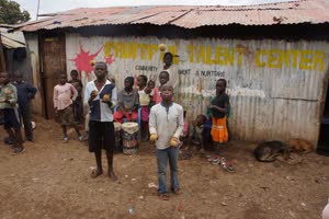 5:binary?id=EA0CbrxDo7XlyQXHdsIQACjmXbDOu7F7lZ629lFS_2FJ5eiH5YOzo4Pg_3D_3D:Students from an orphans' school in the Kibera Slum perform juggling to keep the school afloat