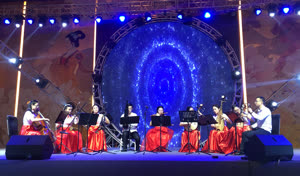 1:binary?id=LlQ_2F4EZq_2FX6PZuf1y3JGKIP5sAeUUbTZvQI2WT7EG8n1b4J3T8I_2Bp_2FpRxVOqIDDU:Members of the UM Chinese Orchestra perform at a gathering at Xi’an Jiaotong University